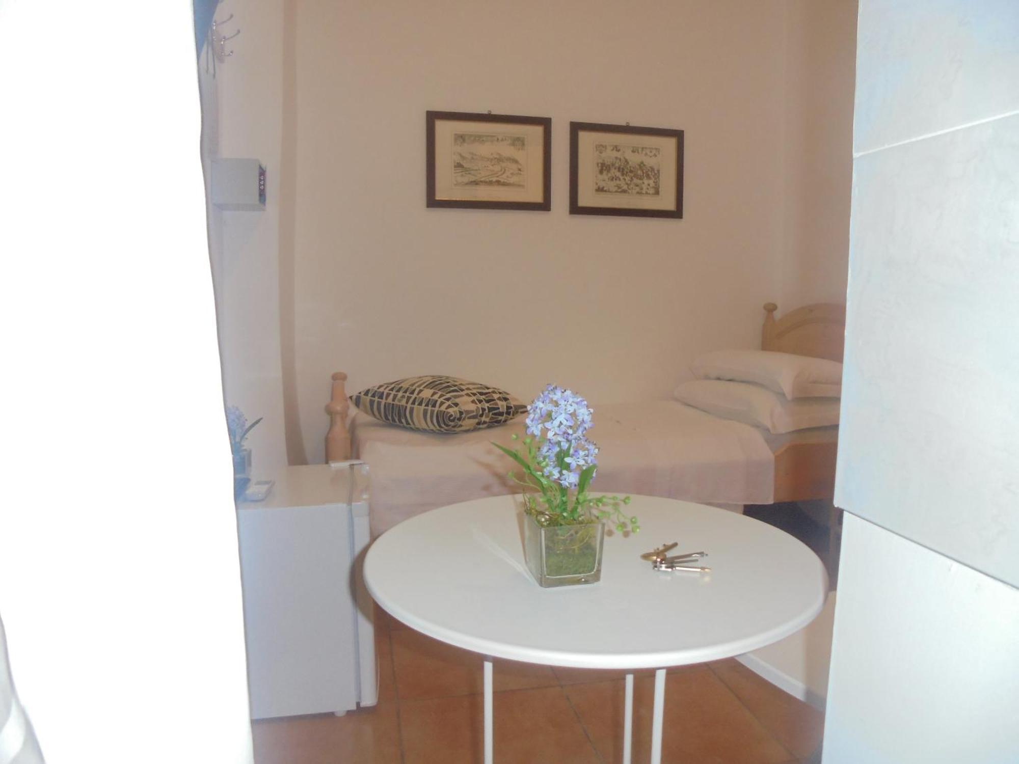 לינה וארוחת בוקר רומא Residenza Vespasiano חדר תמונה